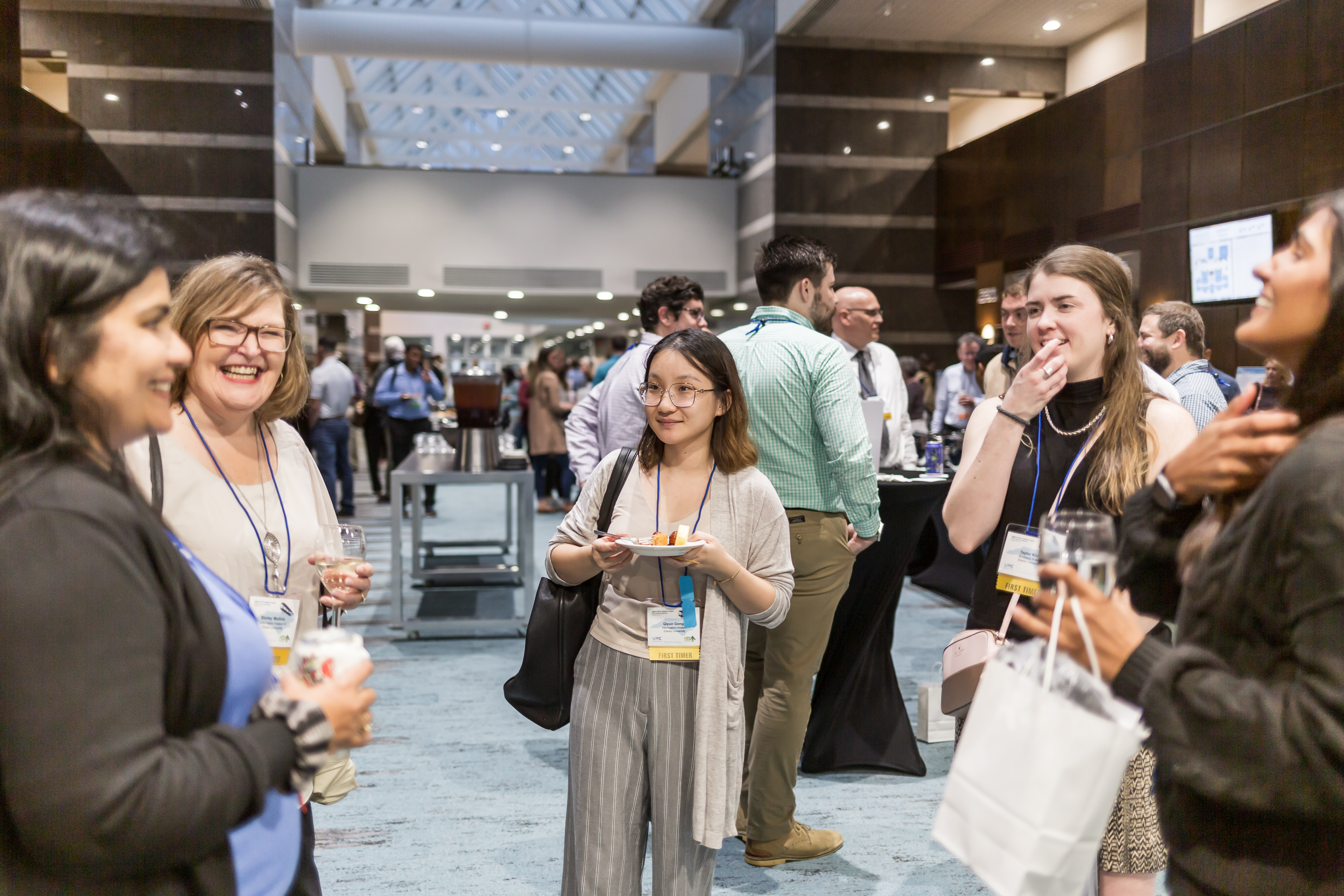 Emory Healthcare contingent enjoying Monday's meet-and-greet reception